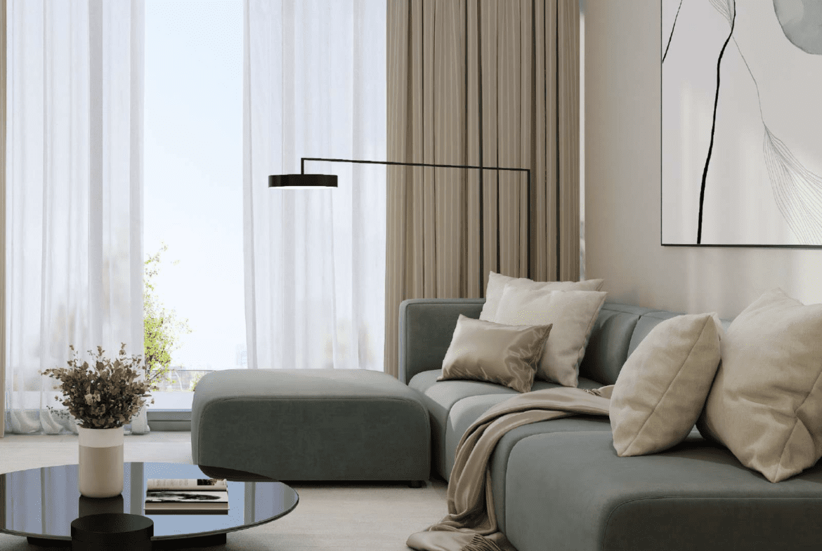 Chic living room with minimalistic decor, cozy sofa, and large window at Cubix Residences in Jumeirah Village Circle, Dubai.