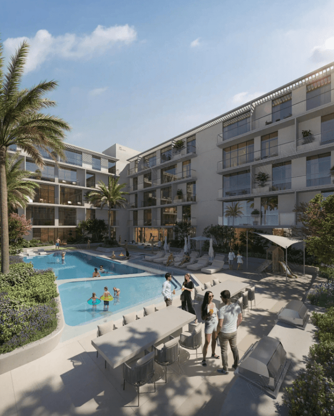 Outdoor swimming pool and social area at Roma Residences, with palm trees, seating arrangements, and residents enjoying the amenities.