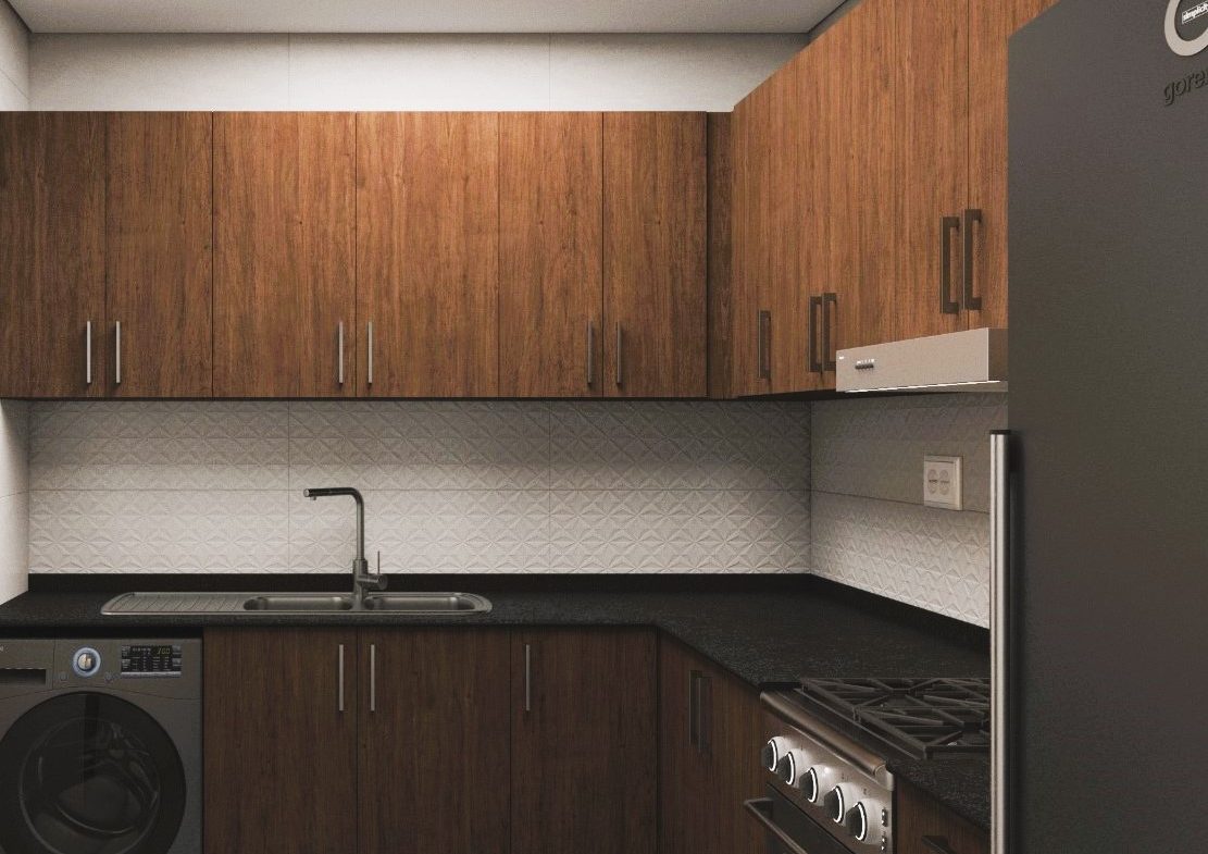 Modern kitchen design in an Ajman One Phase 2 apartment featuring wooden cabinets and sleek appliances.