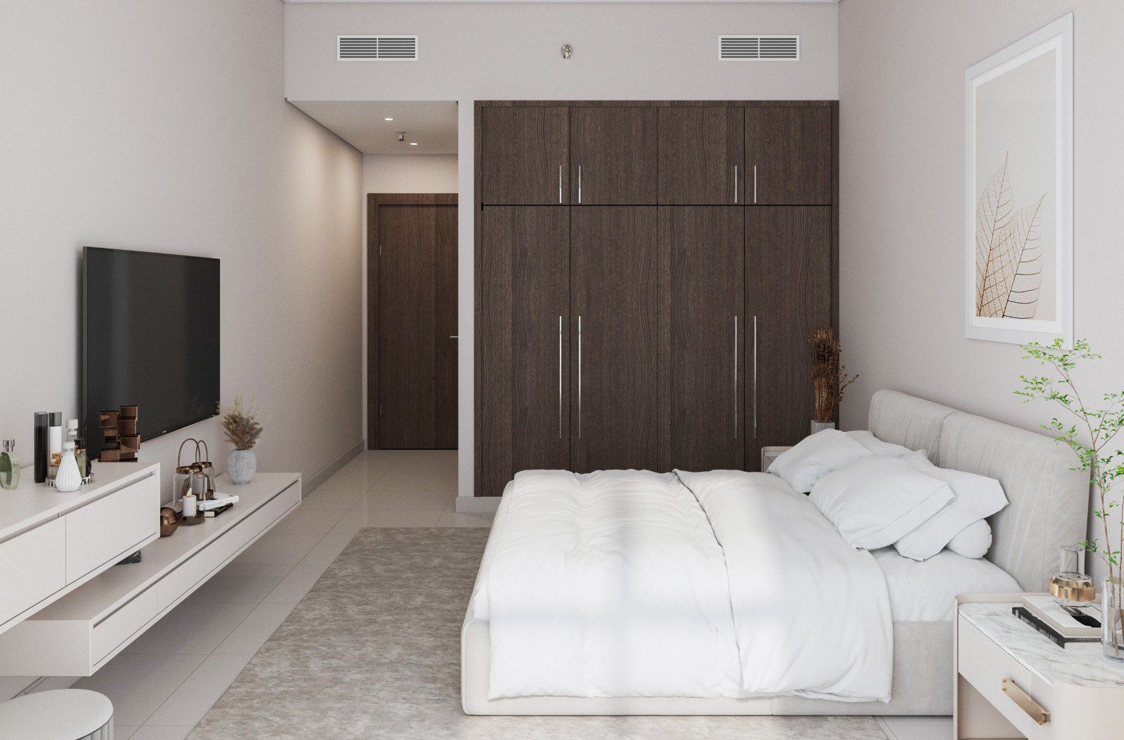 Stylish bedroom interior of an Ajman One Phase 2 apartment with contemporary furnishings.