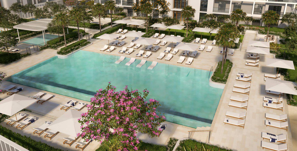 Poolside area at Cello by Taraf featuring lounge chairs and a landscaped garden.