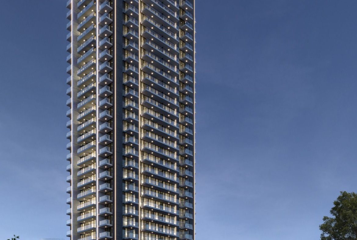 Stunning night view of Violet Tower, highlighting its modern architecture and illuminated facade.